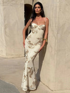 Chic Floral Embroidered Backless Maxi Dress With Low Neck And Crossback