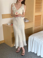 Allover Printed Dress With V Neckline Ruffles And Sleeveless Silhouette