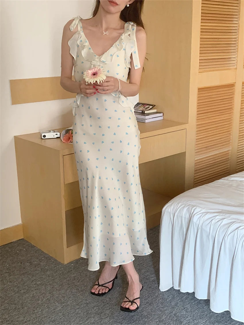 Allover Printed Dress With V Neckline Ruffles And Sleeveless Silhouette