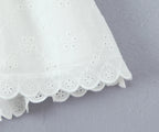 White Embroidered Lace V Neck Mini Dress With Hollow Out Detail And Back Zipper Closure