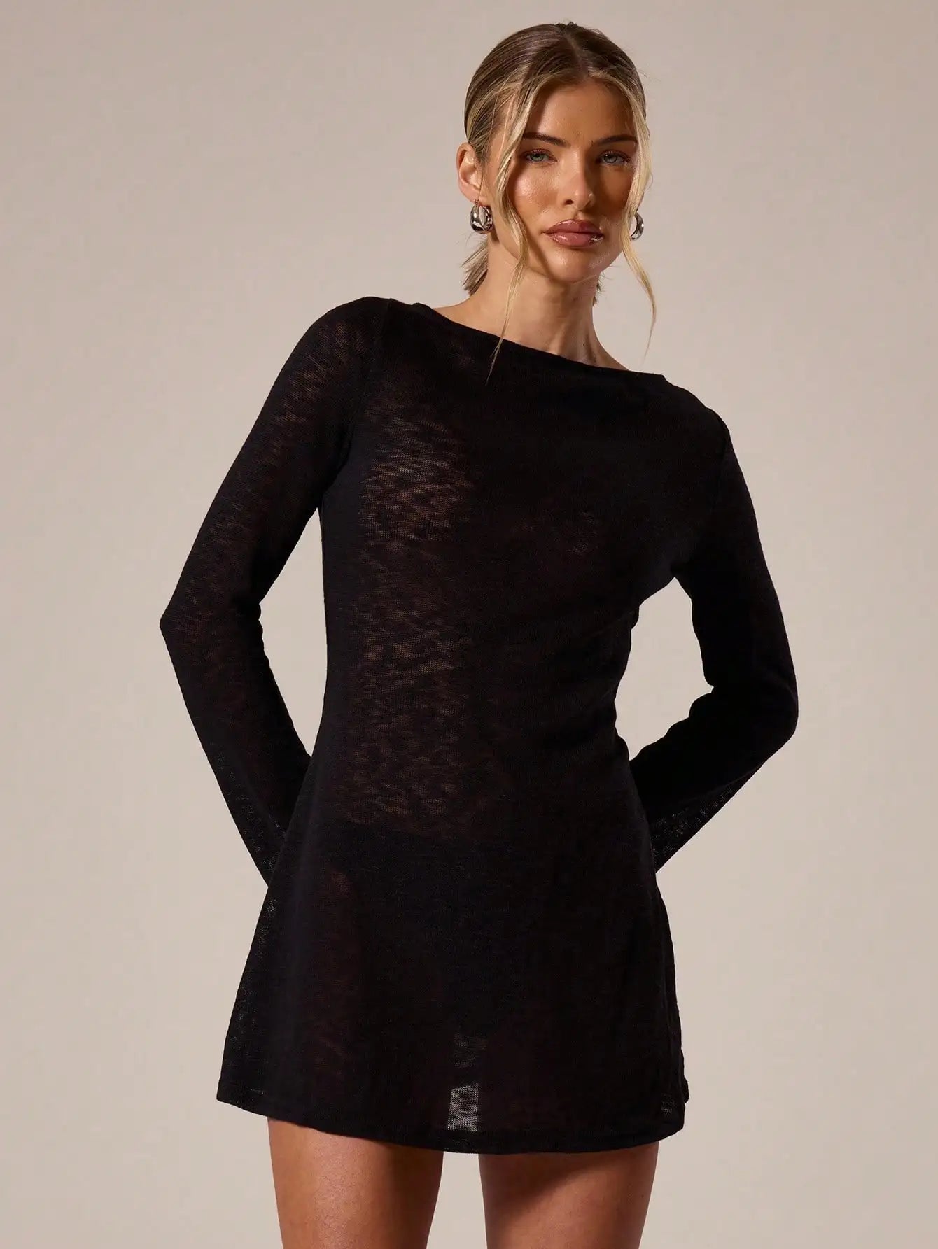 A Line Knit Mini Dress With Slash Neck And Bell Sleeves