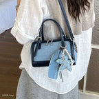 Denim Crossbody Bag With Embroidered Ruched Detailing And Subtle Rivet Accents