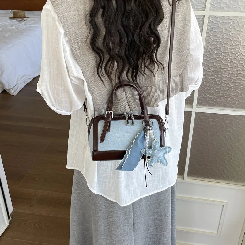 Denim Crossbody Bag With Embroidered Ruched Detailing And Subtle Rivet Accents