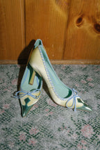 Retro Pink Satin Pointed Toe Pumps With Gold Toe Cap And Yellow Bow Accent Playful Low Heel