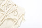 Irregular Tiered Flare Pants With Patchwork See Through
