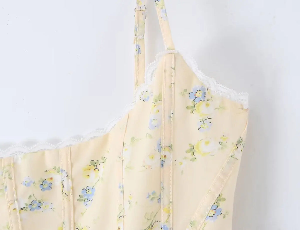 Sunlit Yellow Floral Corset Top With Lace Trim And Delicate Spaghetti Straps