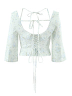 Floral Corset Style Crop Top With Cross Lacing And Ruffle Square Collar Three Quarter Sleeve