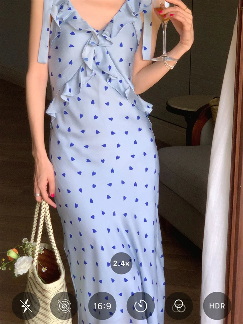 Allover Printed Dress With V Neckline Ruffles And Sleeveless Silhouette