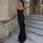 Chic Black Suspender Dress With Tied Waist Charm And Elegance